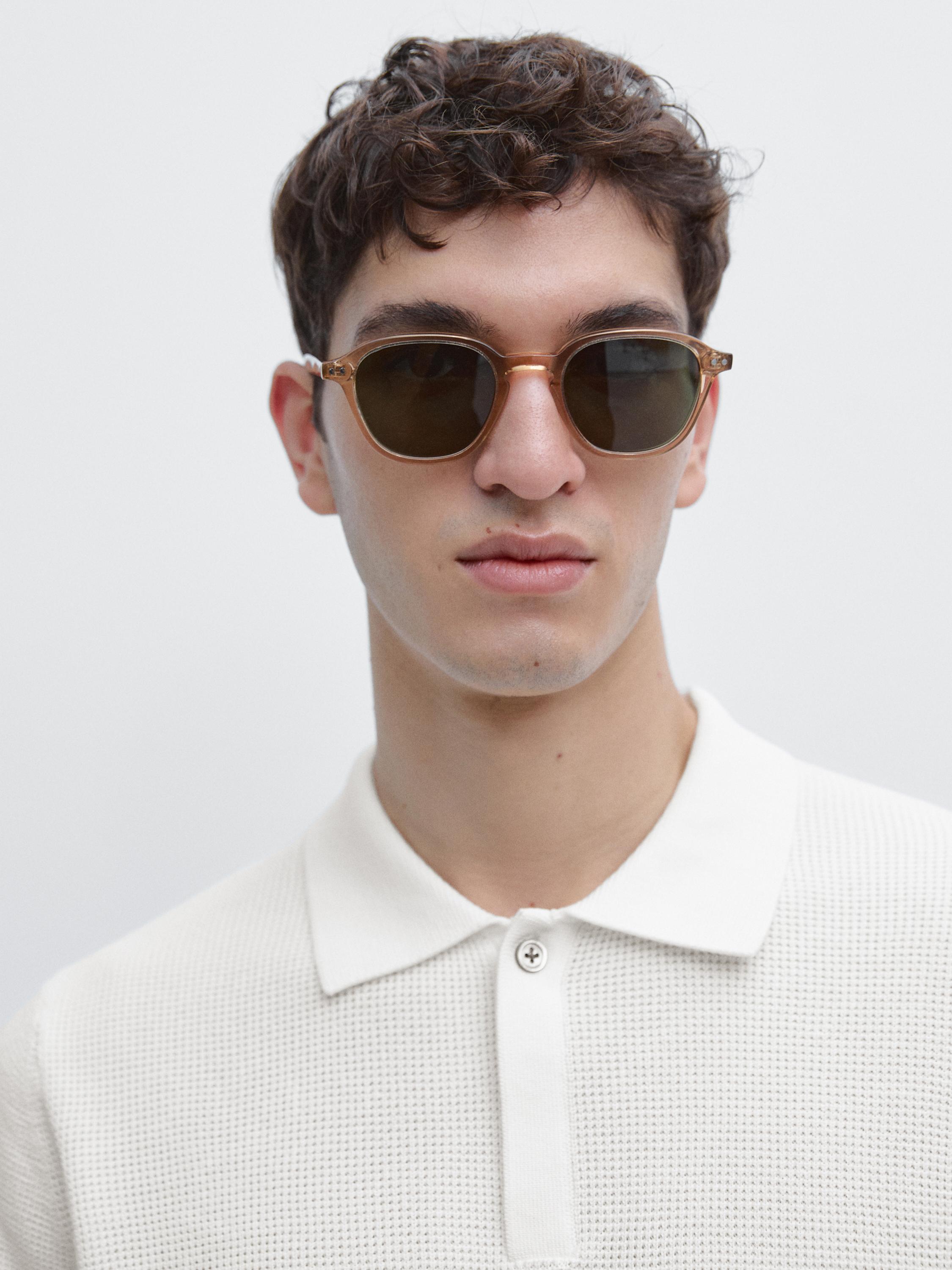 Polo en maille texturée de coton